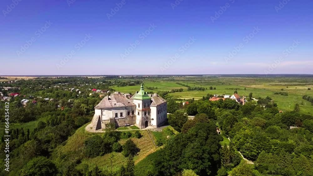 Aerial view of the Olesky Castle and residential neighborhoods near it Aerial view of the Olesky Castle and residential neighborhoods near it