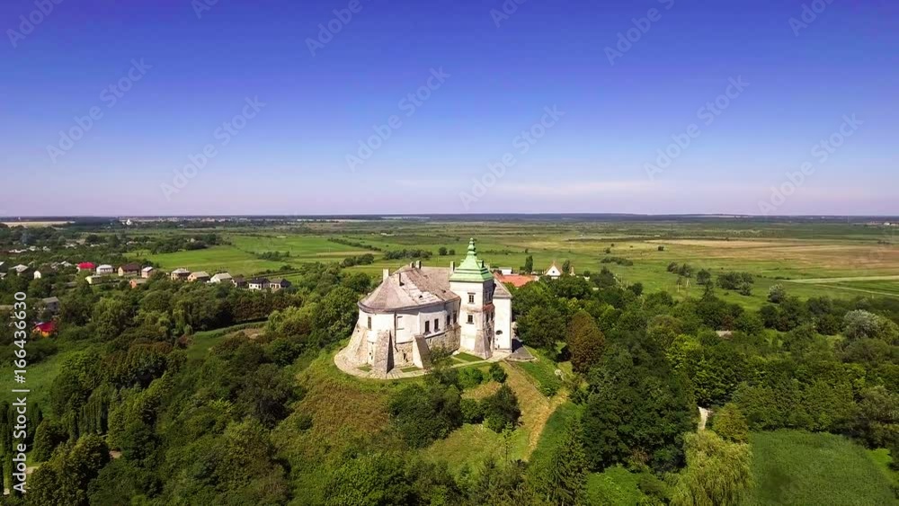 Aerial view of the Olesky Castle and residential neighborhoods near it Aerial view of the Olesky Castle and residential neighborhoods near it