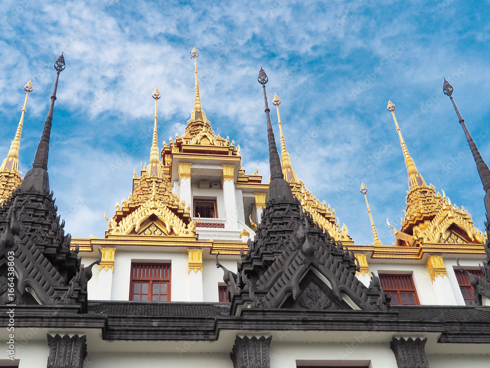 Fototapeta premium Bangkok famous place temple Iron Palace, Loha Prasat, in the area of Wat Ratchanatdaram (Royal Niece). This temple is one of the most attractive landmark in Bangkok, Thailand.