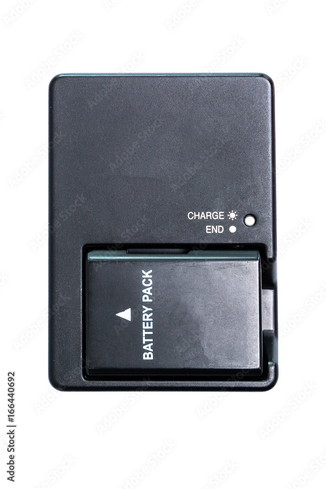 Camera battery with charger. Isolated on white background with clipping path Camera battery with charger. Isolated on white background with clipping path