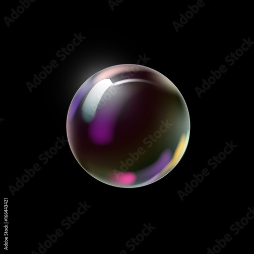 Colorful soap bubble on a dark background.