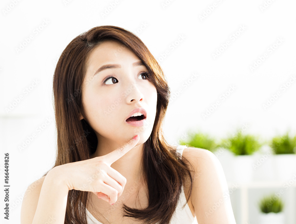 young asian woman relaxing and thinking. young asian woman relaxing and thinking.