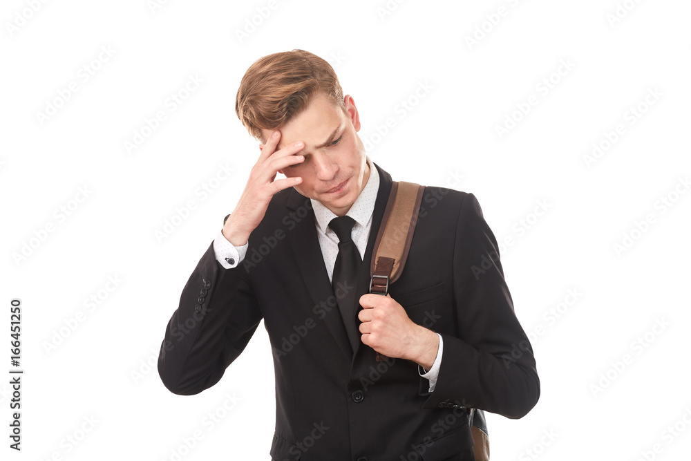 Studio portrait of teenage college student in black suit posing against white background Studio portrait of teenage college student in black suit posing against white background