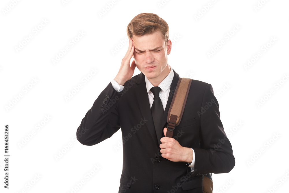 Studio portrait of teenage college student in black suit posing against white background Studio portrait of teenage college student in black suit posing against white background