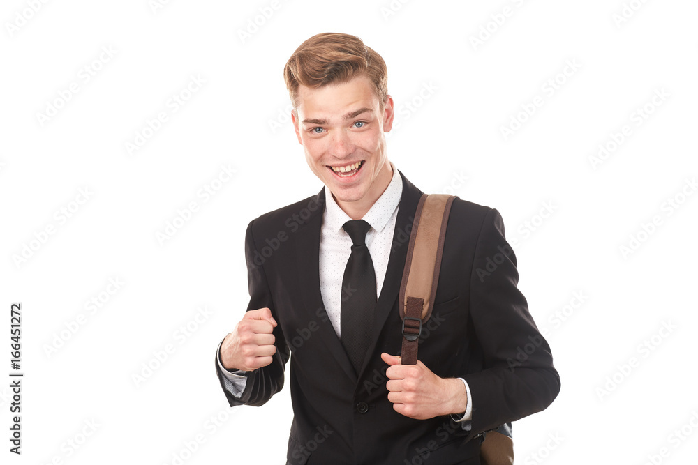 Studio portrait of teenage college student in black suit posing against white background Studio portrait of teenage college student in black suit posing against white background