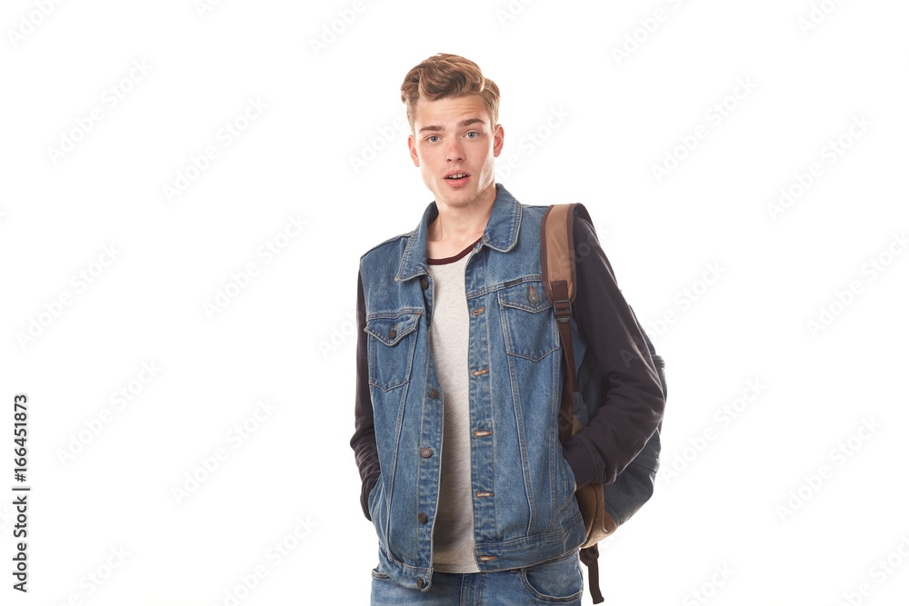 Fototapeta premium Portrait of schoolboy expressing emotions against white background