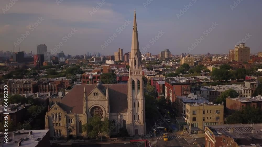 day orbiting counter clockwise around church in Park Slope Brooklyn revealing Manhattan skyline day orbiting counter clockwise around church in Park Slope Brooklyn revealing Manhattan skyline