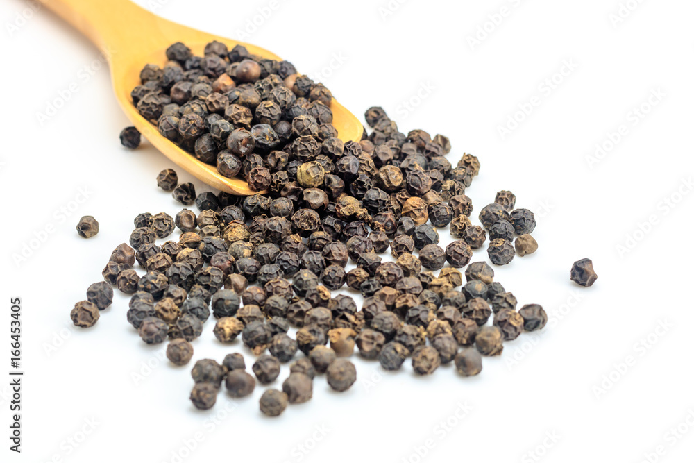 Peppercorn with wooden spoon on white background. Composition isolated over the white background. Peppercorn with wooden spoon on white background. Composition isolated over the white background.