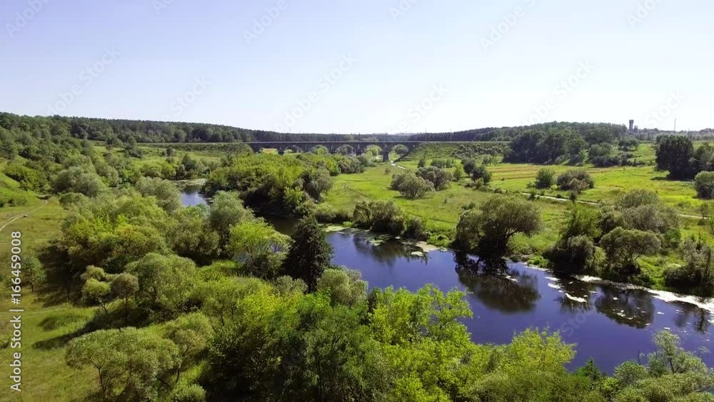 Aerial view of the river near the railway bridge Aerial view of the river near the railway bridge