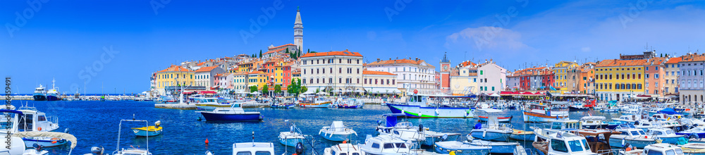 Wonderful romantic old town at Adriatic sea. Boats and yachts in harbor at magical summer. Rovinj. Istria. Croatia. Europe.
