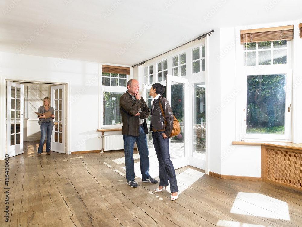 Real estate agent showing empty house Real estate agent showing empty house
