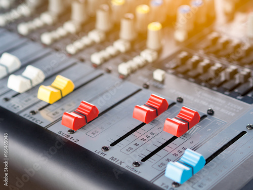 button line of audio sound mixer console. Flare light.