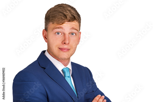 Friendly and smiling businessman looking at camera, isolated on white background in suit.