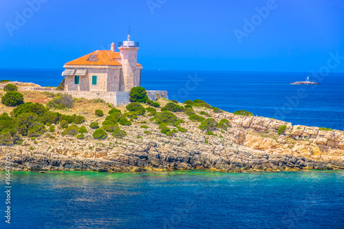Fototapeta Naklejka Na Ścianę i Meble -  Adriatic Sea Vis summer. / Seafront coastline view at croatian islands in Adriatic Sea, Mediterranean summertime. 