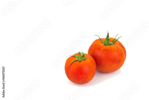 Real organic tomatoes isolated on white background