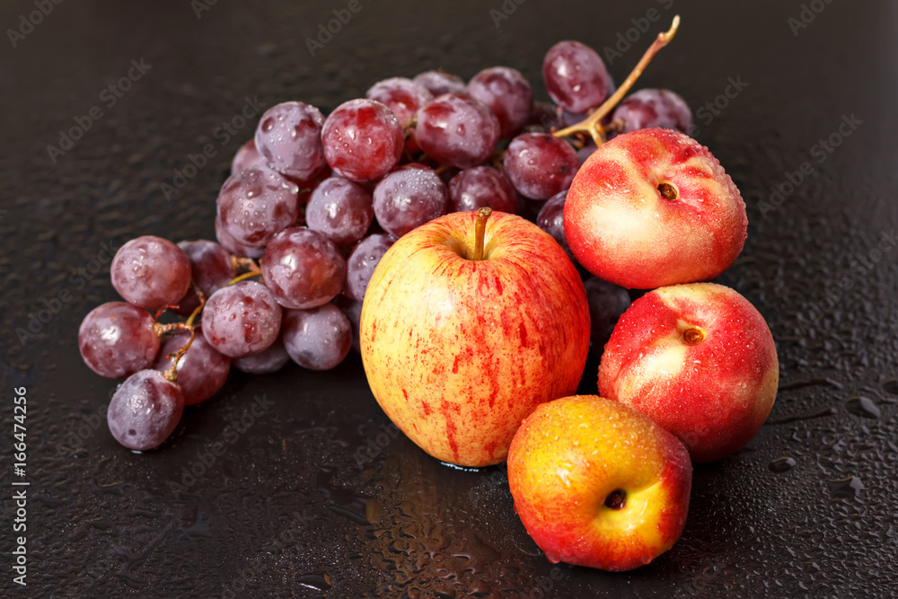 Still life of peaches of apples and grapes Still life of peaches of apples and grapes