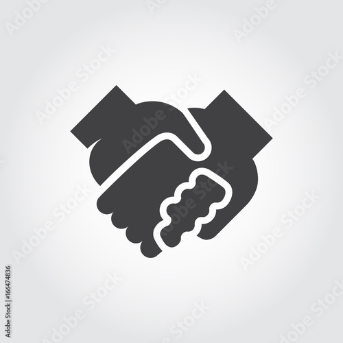 Handshake black flat icon. Symbol of relationship, friendship, partnership, support. Graphic logo with two human hand in hand. Contour arm silhouette. Vector illustration photo