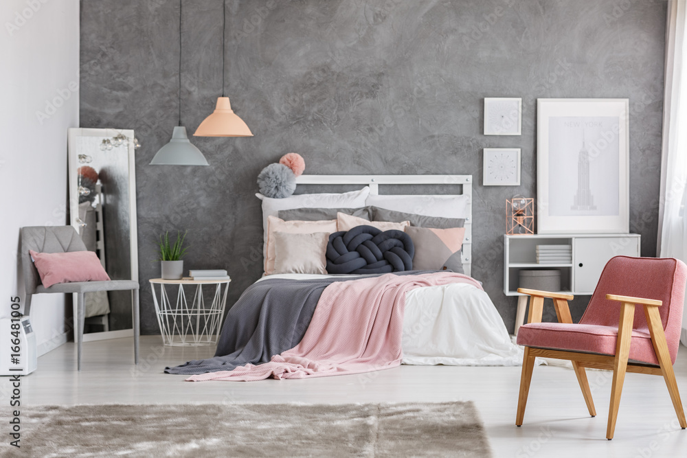 Blankets falling off the bed StockFoto Adobe Stock