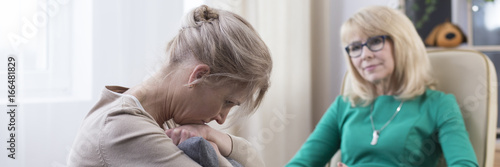 Stressed woman during therapy photo