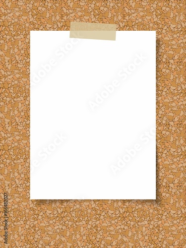 Clean white sheet of paper on the background of a cork board
