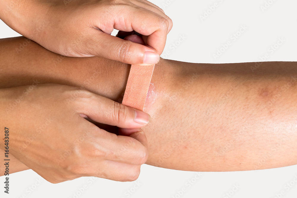 Woman nursing a injured knee. Woman nursing a injured knee.