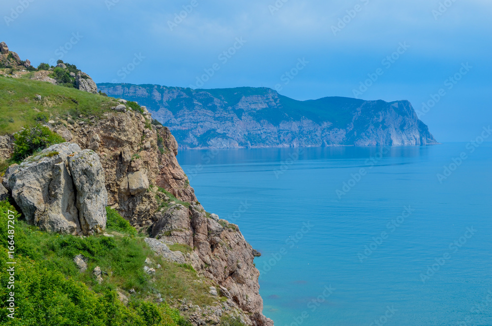 Steep, sharp, stone beaches on the Black Sea coast, in the vicinity of the city of Sevastopol of the Republic of Crimea, 2017