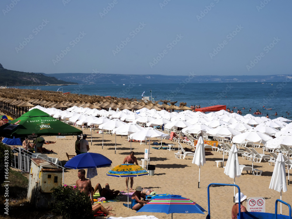GOLDEN SANDS, BULGARIA -JULY 1:, 2017 Crowded beach with tourists in summer on July 1, 2017 in Golden Sands, Bulgaria.