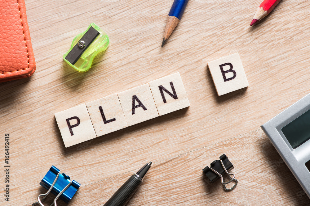 Conceptual business keywords on table with elements of game making crossword Conceptual business keywords on table with elements of game making crossword