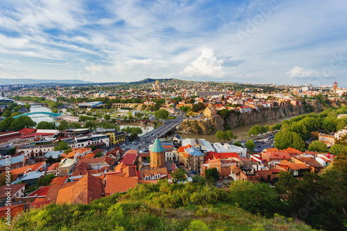 Aerial view on Holy Trinity Cathedral of Tbilisil (Sameba). Sunset view on Tbilisi, Georgia. photo