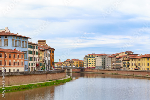 Riverside buildings at river Arno in Pisa, Italy