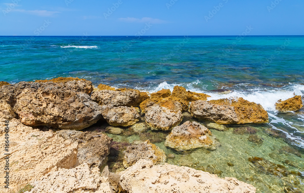 Rocks on shore of sea near Gouves, Crete, Greece. Rocks on shore of sea near Gouves, Crete, Greece.