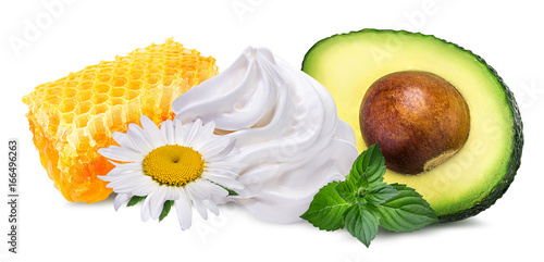 chamomile ,honey, mint,cream and avocado isolated on white