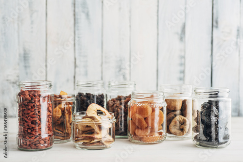 Food: Different dehydrated berries in jars