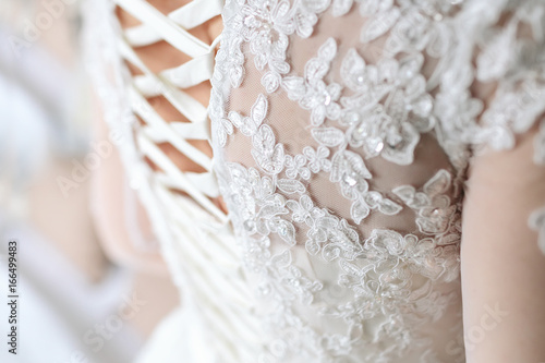 Fotografia Image of the detailed laces on the back of a wedding dress