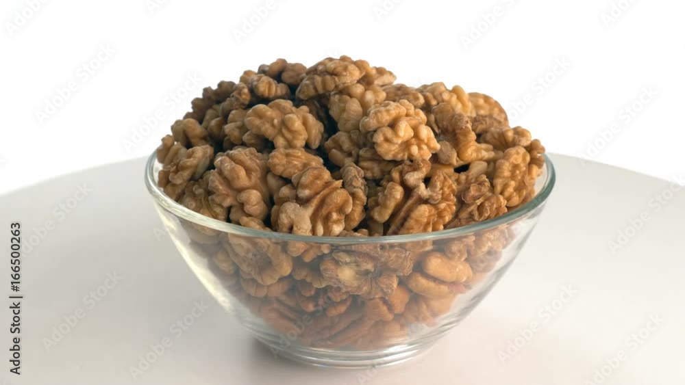 The nut walnut rotates on the turntable. The nut walnut rotates on the turntable.