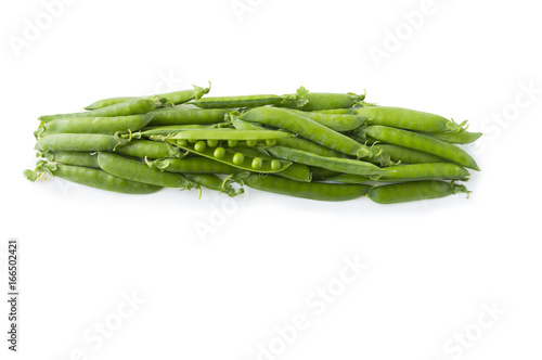 Green peas isolated on a white background. Green peas at border of image with copy space for text.