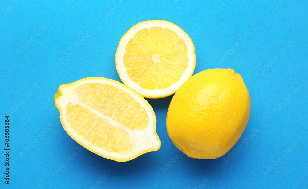 Delicious fresh lemons on color background Delicious fresh lemons on color background