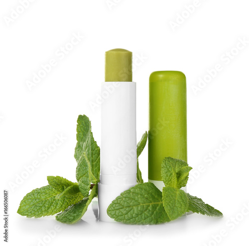 Hygienic lipstick with lemon balm on white background