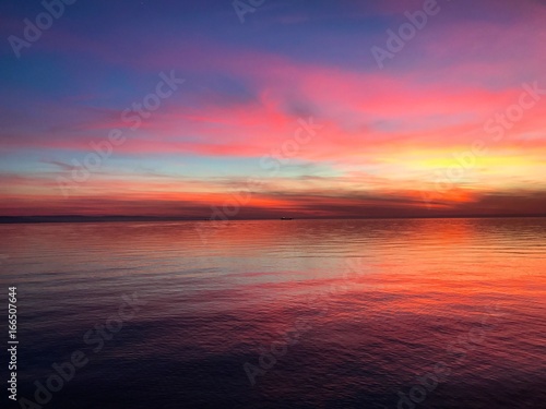 Incredibly colorful sunset in Trieste Italy