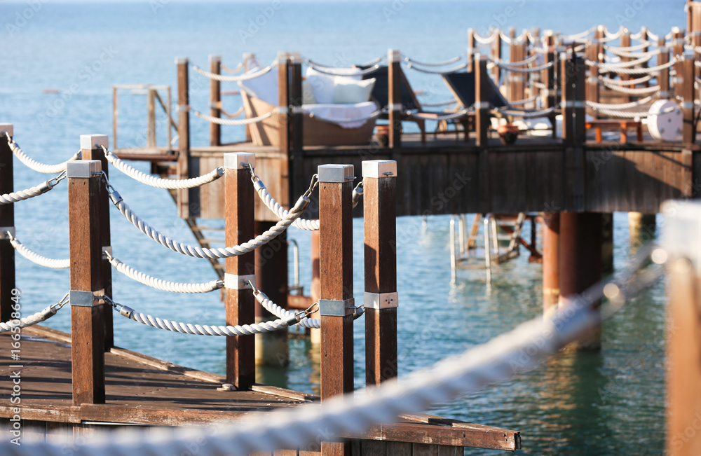 View of wooden fence on pier View of wooden fence on pier