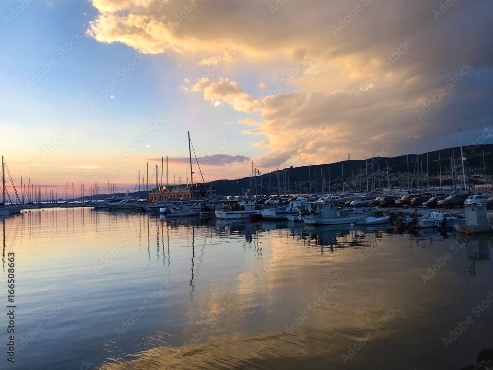 wonderful sunset at the harbor in Trieste Italy