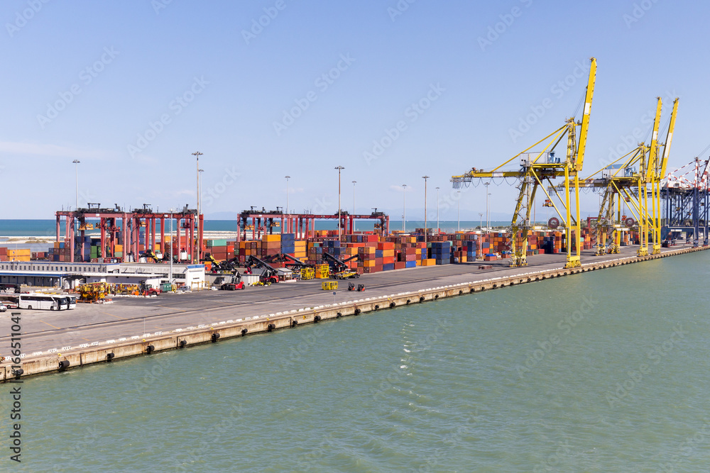 Harbor infrastructure with cranes and containers