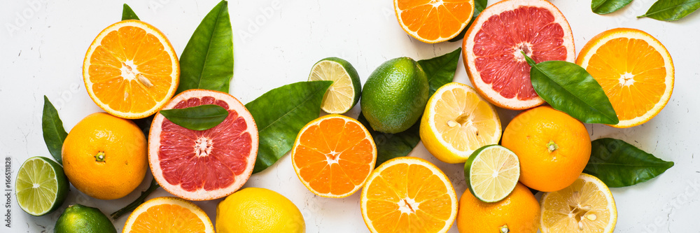Fresh citrus fruit assortment on white. Fresh citrus fruit assortment on white.