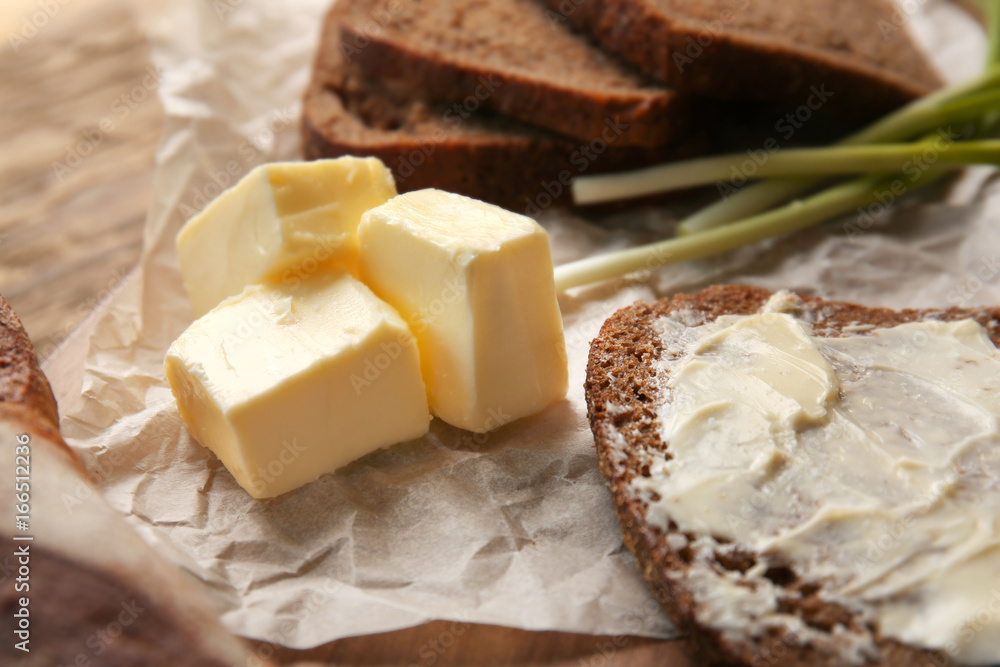 Delicious toast and butter on table, closeup Delicious toast and butter on table, closeup