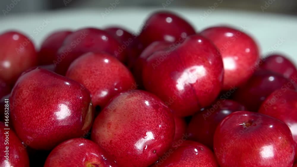 Fresh, ripe, juicy cherries rotate. Red cherry clockwise Fresh, ripe, juicy cherries rotate. Red cherry clockwise