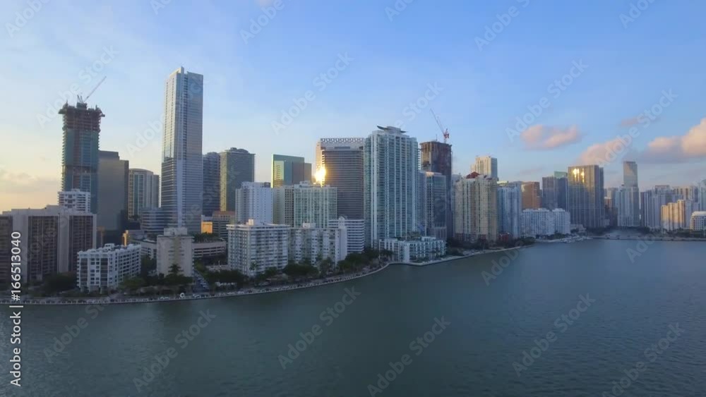 Aerial shot of buildings in Miami from the ocean during sunset Aerial shot of buildings in Miami from the ocean during sunset