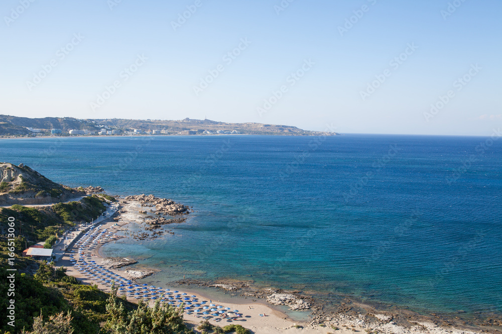 Famous nudist beach in Faliraki. Top view of the beach in Rhodes. Popular beach on the island.