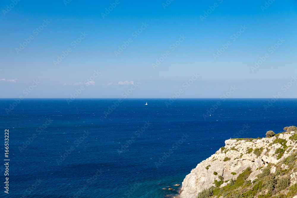 Lonely sailboat on the ocean,