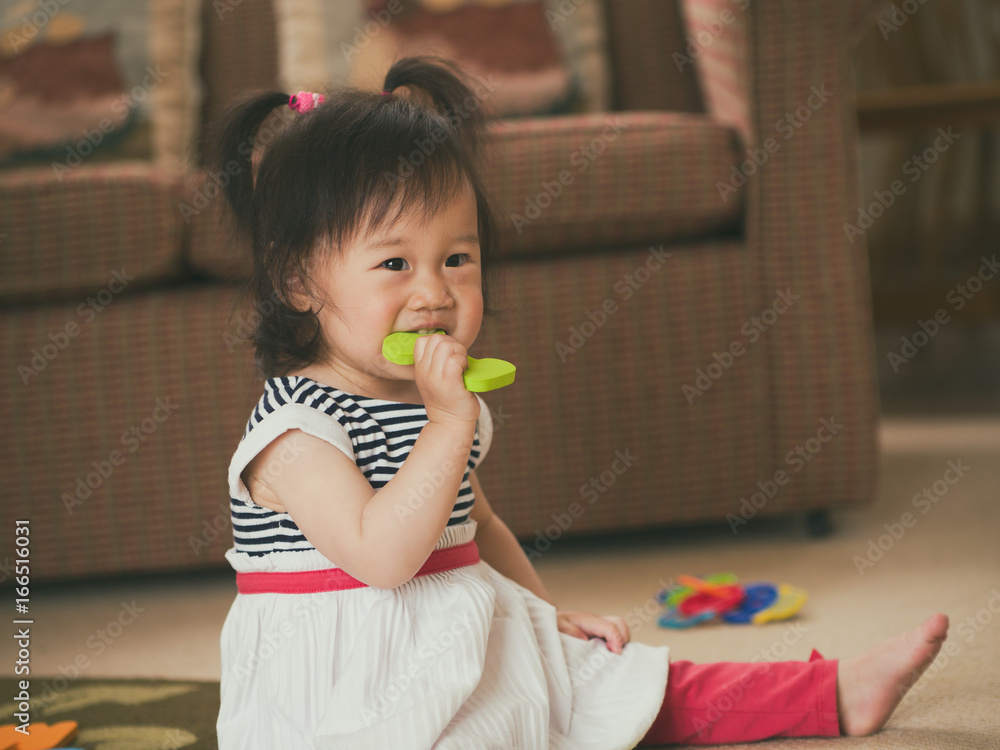 baby girl playing toy at home baby girl playing toy at home