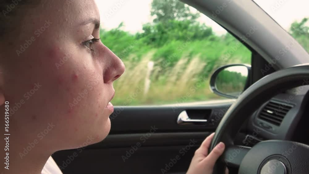 Happy Girl in a car driving and singing Happy Girl in a car driving and singing